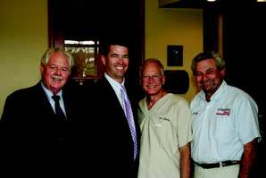 Left to right: Dennis Mhyre, Field Sales Consultant; Jim Weber, Equipment Sales Specialist; Dr. Robert Cherry; Jerry Hardman, Equipment Service Technician