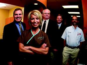 Left to right: Jerry Walters, Field Sales Consultant; Dr. Susanne Moore, Bobby Manuel, Equipment Sales Specialist; Todd Carter, Regional General Manager; Larry Foster; Equipment Service Technician