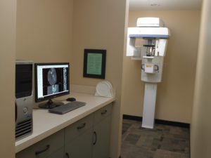 The Instrumentarium OP300 Cone Beam unit, set in a separate alcove, delivers precise digital images that assist the doctor in complex diagnoses and integrates perfectly with the doctor’s Dentrix practice management software.