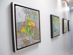 A pop of color in these abstract, yet sophisticated pieces contrast with the cool palette on the walls of the practice.