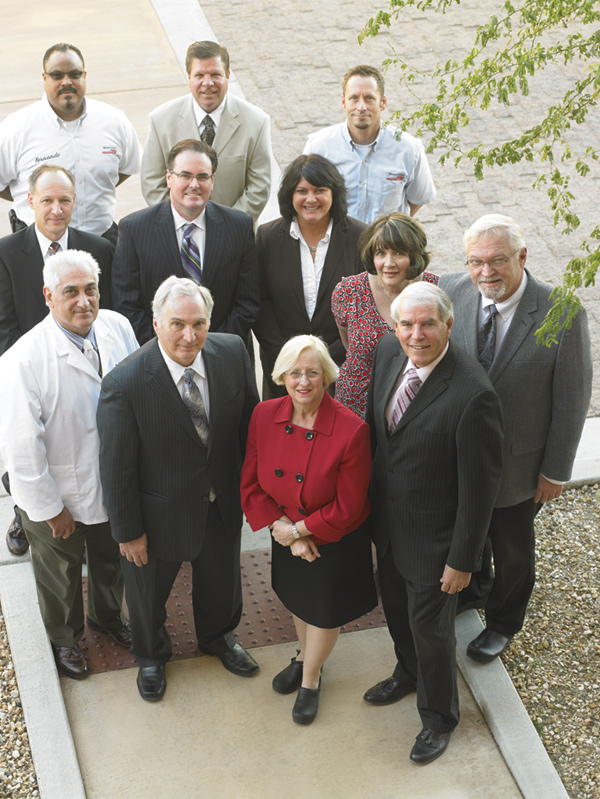 Left to right: Front row–Dr. James Pashayan, Assistant Dean, Midwestern University College of Dental Medicine/Arizona; Dr. Dennis Paulson, Vice President and CAO, Midwestern University; Dr.Kathleen Goeppinger, President and CEO, Midwestern University; Dr. Russell Gilpatrick, Dean, Midwestern University College of Dental Medicine/Arizona; Dr. Arthur Dobbelaere, Executive Vice President and COO, Midwestern University | Left to right: Second row: Randy Kofron, Southwest Regional Special Markets Manager; Kevin Upchurch, Regional Manager; Mary Kellar, Special Markets Manager; Andrea Hight Special Markets Manager/Community Health Liaison | Left to right: Third row: Fernando Maldonado, Project Coordinator; Stephen Weyenberg, Regional Operations Manager; Steven Cardot, Project Coordinator Henry Schein Dental