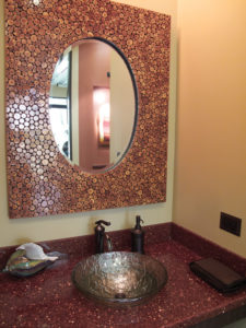 Check out your beautiful smile in this elegant “goodbye” mirror. Located on your way out next to the lobby.