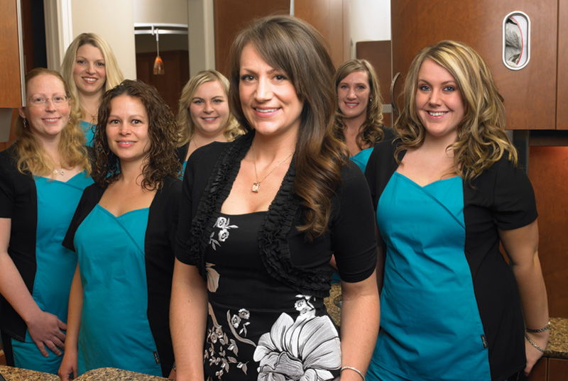 Front row: left to right–Nicole Clauder, fill-in Hygienist; Cathy Jo Kirkpatrick, full-time Hygienist; Dr. Stephanie White; Megan Kristovich, Sterilization Tech; Back row: left to right– Jamie Stratton, front-office and financial coordinator; Heidi Ross, front-office coordinator and financial coordinator; Kathy Sue Maltman, Doctor's Assistant