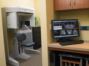 Imaging-capture station and i-CAT cone beam are placed where a traditional panoramic X-ray would fit. Equipped with i-CAT and DEXIS
