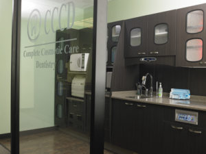 The doctors intentionally designed the sterilization center to sit behind a full wall of glass so patients could clearly see the investment made in their safety and health.