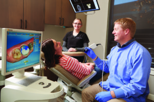 Dr. Shiner scanning a patient