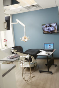 Dr. Corson selected Midmark chairs and lights and opted for compact rear-delivery cabinetry to store supplies and equipment. This provides him with the space to use additional equipment in the operatory, such as the Planmeca PlanScan.