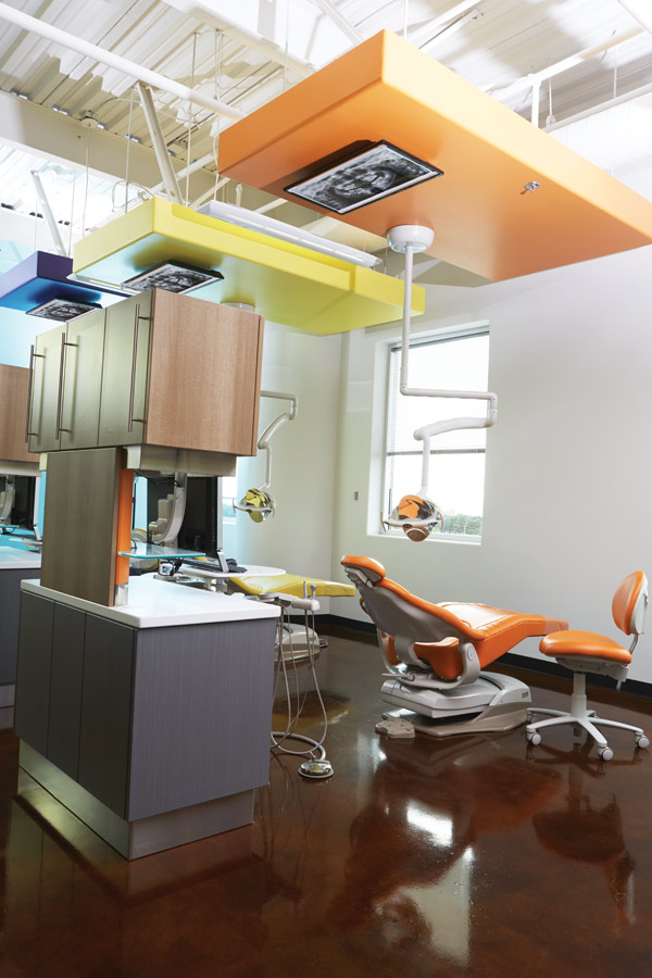 Bright, cheerful Midmark chairs and sleek cabinetry in the pediatric bay create an environment of sophistication, further communicating to patients that Dr. Dutta is commited to cutting-edge technology and patient care.