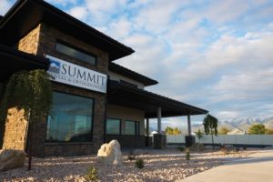 Summit Dental in Layton, UT features a large sign at their entrance.