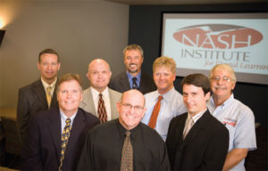 Front row, left to right: Tim Jones, Zone General Manager; Dr.Ross Nash; Vicente Reynal, President Pelton & CraneBack row, left to right: Scott Carringer, Regional General Manager; Gene Bost, Equipment Sales Specialist; Pete Foster, Vice President of Sales, Pelton & Crane; Jay Barringer, Equipment Sales Specialist; Danny Collins, Equipment Service Technician