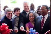 Stanley Bergman (left) and John Spencer (middle) help cut the ribbon at the MUHAS Dental School in Dar es Salaam, Tanzania.