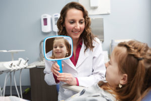 Dr. Dunlop consults a patient.